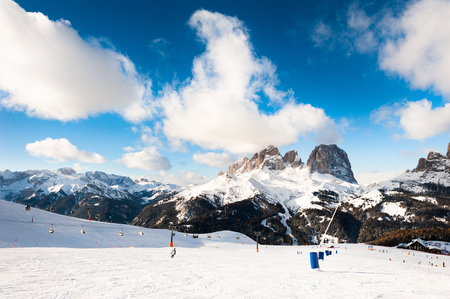 Ski slope in ski resort in Dolomite Alps. Val Di Fassa, Italyの写真素材