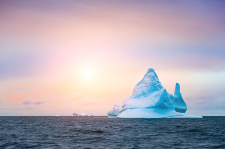 Beautiful iceberg in Ilulissat icefjord at sunset, western Greenlandの写真素材