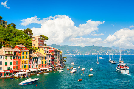 Beautiful sea coast with boats and colorful houses in Portofino, Italyの写真素材