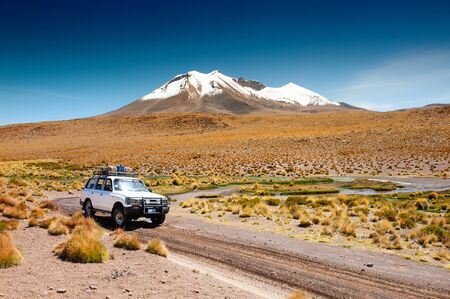 Altiplano, Bolivia - March, 27, 2017: Off-road car driving in the desert on Altiplano plateau, Boliviaのeditorial素材