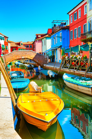 Colorful houses on the canal in Burano, Venice, Italyの写真素材