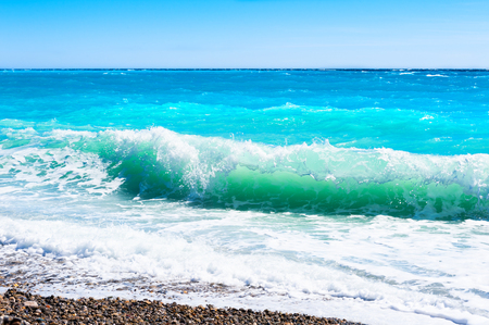 Turquoise sea and the blue sky. Beautiful beach in Nice, France. Cote d'azur, french riviera. Travel and vacationの写真素材