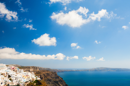 Blue sky with clouds over Santorini island, Greece. Beautiful landscape with sea viewの写真素材