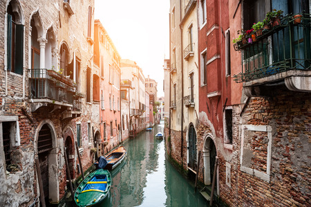 Scenic canal with old architecture in Venice, Italy.の写真素材