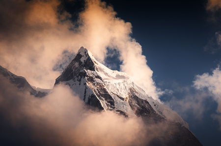 Peak of Mount Kangtega in Himalaya mountains at sunset. Khumbu valley, Everest region, Nepalの写真素材