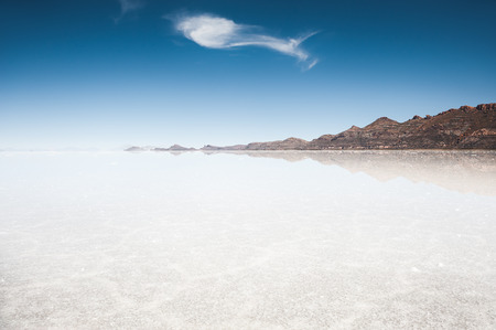 Water surface of Salar de Uyuni salt flat. Altiplano, Boliviaの写真素材