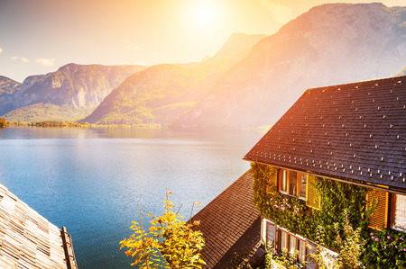 Hallstatt village on the shore of lake in Alps mountains, Austria. Beautiful autumn landscapeの写真素材