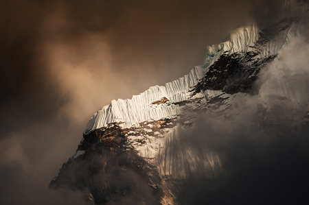 Snow formation on the mountain, Himalayas. Ama Dablam peak with clouds at sunset, Khumbu valley, Everest region, Nepalの写真素材