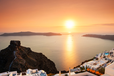 Beautiful sunset on Santorini island, Greece. Famous travel destination. Summer landscape, sea viewの写真素材