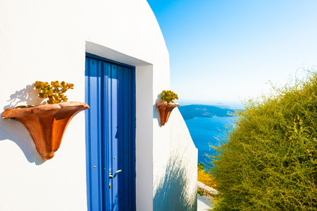 Traditional greek architecture on Santorini island, Greece. Beautiful summer landscape, sea viewの写真素材