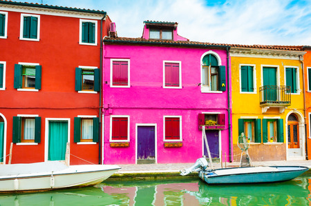 Colorful houses on the canal in Burano island, Venice, Italy. Famous travel destinationの写真素材