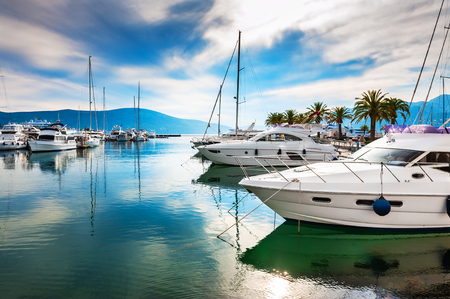 Luxury yachts in the sea port of Tivat, Montenegro. Kotor bay, Adriatic sea. Famous travel destination.の写真素材