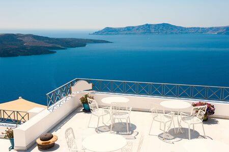 Santorini island, Greece. Beautiful terrace with sea view. Famous travel destinationの写真素材