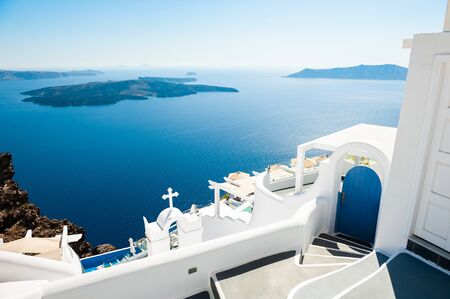 White architecture on Santorini island, Greece. Summer landscape with sea view. Famous travel destinationの写真素材
