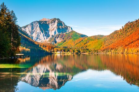 Mountauns with reflections on the lake in Alps, Austria. Vorderer Langbathsee lake. Beautiful autumn landscapeの写真素材