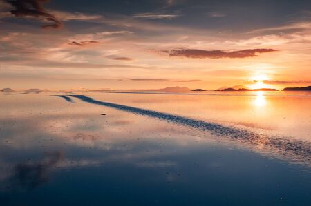 Beautiful sunset on Salar de Uyuni salt flat, Bolivia. South America landscapes