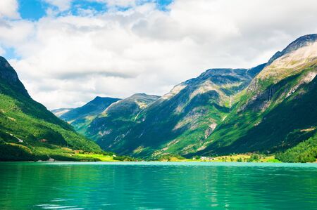 Oldevatnet lake with green water in the mountains in Norway. Beautiful summer landscapeの写真素材