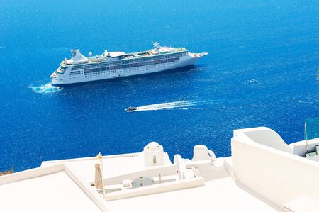 Cruise ship near Santorini island, Greece. Beautiful sea view. Famous travel destinationの写真素材