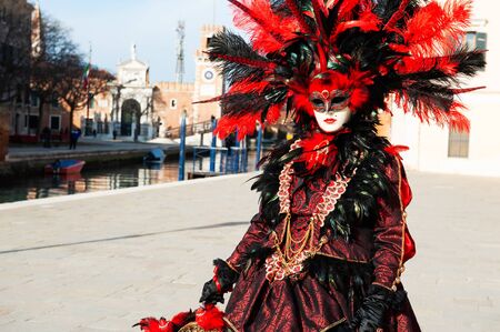 Beautiful colorful masks at traditional Venice Carnival in February 2020 in Venice, Italyのeditorial素材