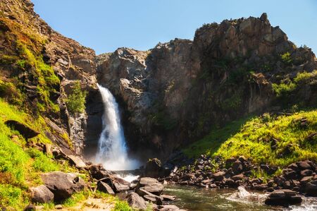 Kurkure waterfall in Altai mountains, Siberia, Russia. Beautiful summer landscapeの写真素材