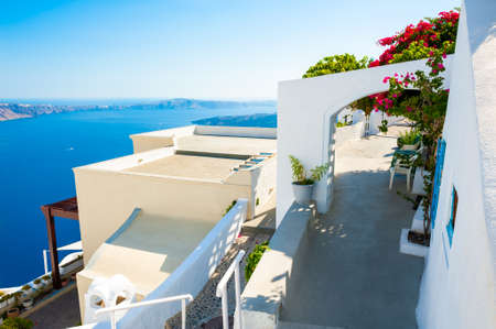 White architecture and blue sea on Santorini island, Greece. Summer holidays, travel destinations...