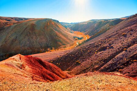 Red mountains in Kyzyl-Chin valley, also called as Mars valley in Altai mountains, Siberia, Russia. Beautiful autumn landscape. Famous travel destinationの写真素材