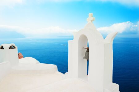 White architecture on Santorini island, Greece. Beautiful sea view. Famous travel destinationの写真素材