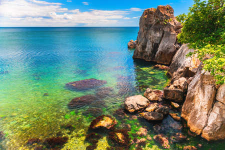 Beautiful bay with turquoise water and cliffs. Black sea, Gurzuf village, southern coast of Crimea peninsula, Russiaの写真素材