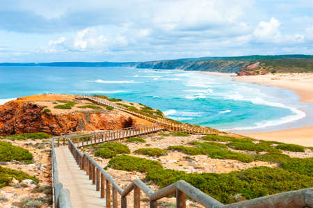 Beautiful shore of Atlantic ocean and stairs to the beach. Algarve, Portugal. Famous travel destinationの写真素材