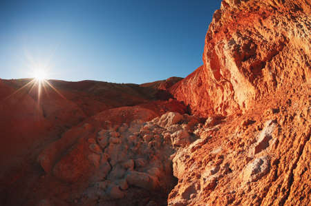 Red mountains in Kyzyl-Chin valley, also called as Mars valley in Altai mountains, Siberia, Russia. Beautiful autumn landscape. Famous travel destinationの写真素材