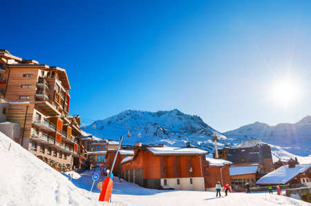 Winter ski resort in Alps. Val Thorens village, 3 Valleys ski resort, France. Beautiful mountains and the blue skyのeditorial素材
