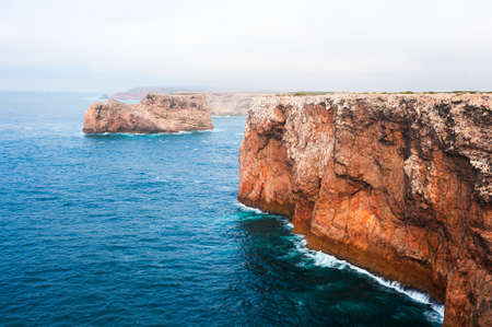 Rocky coast of Atlantic ocean in Cape St. Vincent, Algarve, Portugal. This is the most South-Western point of Europeの写真素材