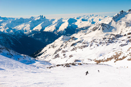 Ski resort in winter Alps. Val Thorens, 3 Valleys, France. Beautiful mountains and the blue sky, winter landscapeの写真素材