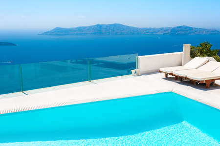 Luxury swimming pool with sea view.の写真素材