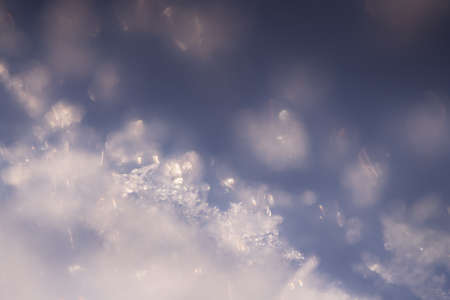 Macro image of snowflakes, shallow depth of field. Beautiful winter nature backgroundの写真素材