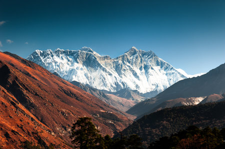 View of Everest mount, Lhotse and Nuptse peaks at sunrise from Tengboche village, Nepal. Everest Base Camp trek. Beautiful autumn landscapeの写真素材