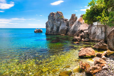 Beautiful sea shore with turquoise water and cliffs. Gurzuf village, southern coast of Crimea peninsula. Summer seascapeの写真素材