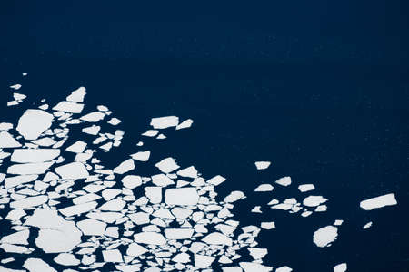 Melting ice on the lake. abstract nature background. Aerial drone view. Baikal lake, Siberia, Russia. beautiful spring landscapeの写真素材