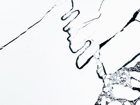 Melting ice on the lake. abstract nature background. Baikal lake, Siberia, Russia. beautiful spring landscapeの写真素材