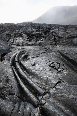 Black lava fields near Tolbachik volcano in Kamchatka, Russia. Lava flows of the eruption of Tolbachik volcano in 2013の写真素材