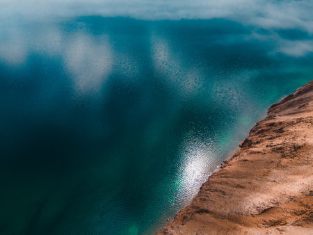 Beautiful shore and clear blue water of Baikal lake. Aerial view. Baikal lake, Siberia, Russia. Spring landscapeの写真素材