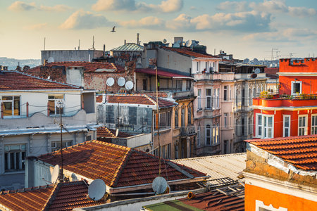 Rooftops at sunset in Istanbul, Turkey. Old architecture in Karakoy district. Summer cityscape at sunsetの写真素材