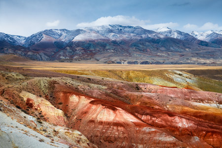 Red colorful mountains in canyon. Kyzyl-Chin valley in Altai, Siberia, Russia. Beautiful autumn landscapeの写真素材