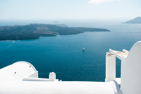 White architecture in Santorini island, Greece. Beautiful terrace with sea view. Travel and vacation conceptの写真素材