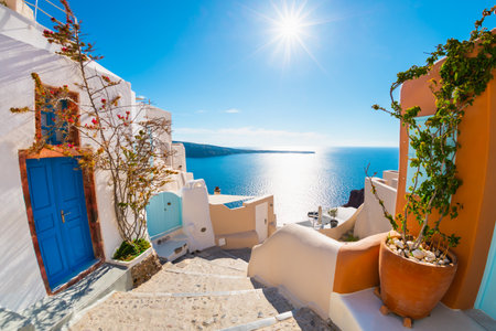 Colorful architecture in Santorini island, Greece. Stairs to the sea port in Oia town. Famous travel destinationの写真素材