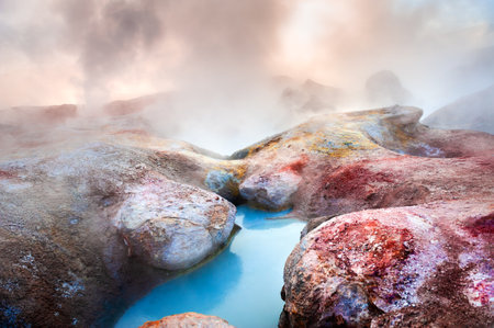 Sol de Manana geysers and fumaroles in Altiplano plateau, Bolivia. Fumaroles vapour at sunrise.の写真素材