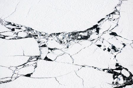 Melting ice on Baikal lake in spring. Baikal lake, Siberia, Russia. Abstract nature background....