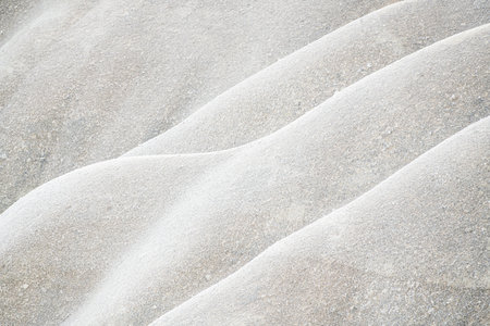 White sand hills close up. Abstract natural background. Sandstone rock formations in Cappadocia, Turkey.の写真素材
