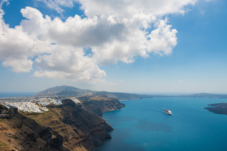 Santorini island, Greece. Blue sea and the blue sky with clouds. Summer seascape. Travel and vacation conceptの写真素材