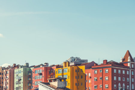 Colorful architecture in Lisbon, Portugal. Red and yellow houses and the blue sky at sunny day. Travel and vacation conceptの写真素材